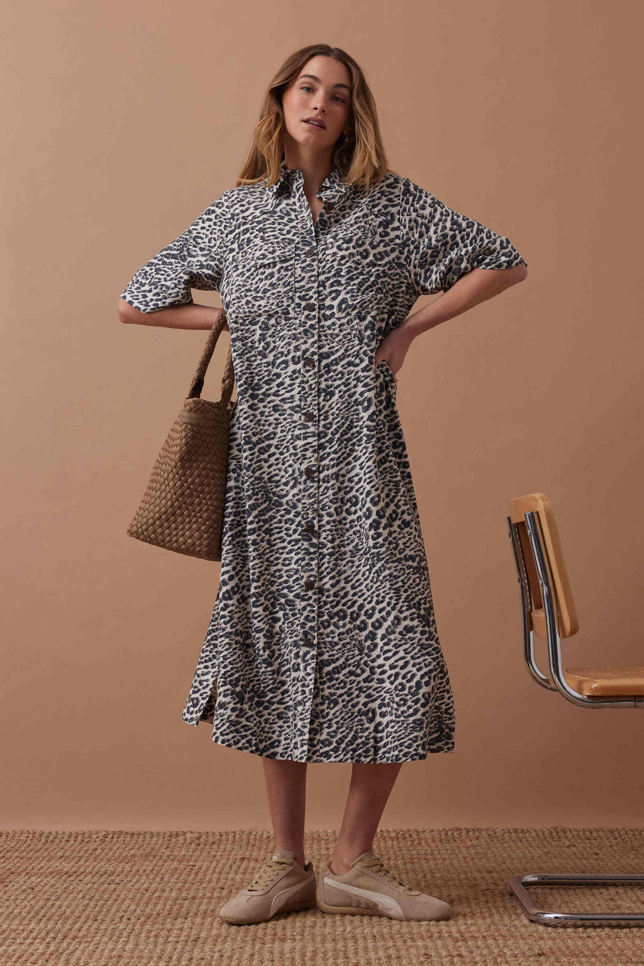 Ava Short Sleeve Midi Dress in Animal Print