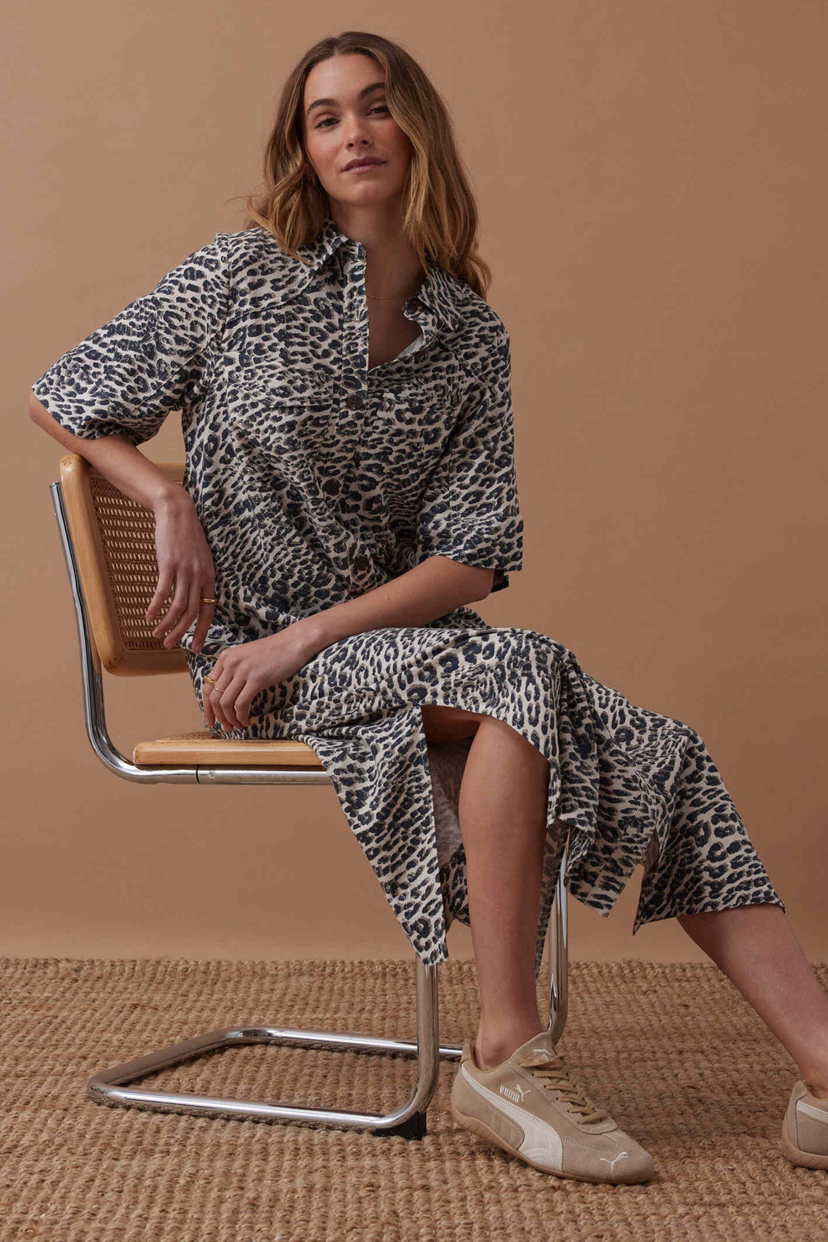Ava Short Sleeve Midi Dress in Animal Print